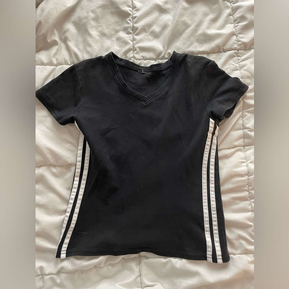 Black v neck with white details down the side